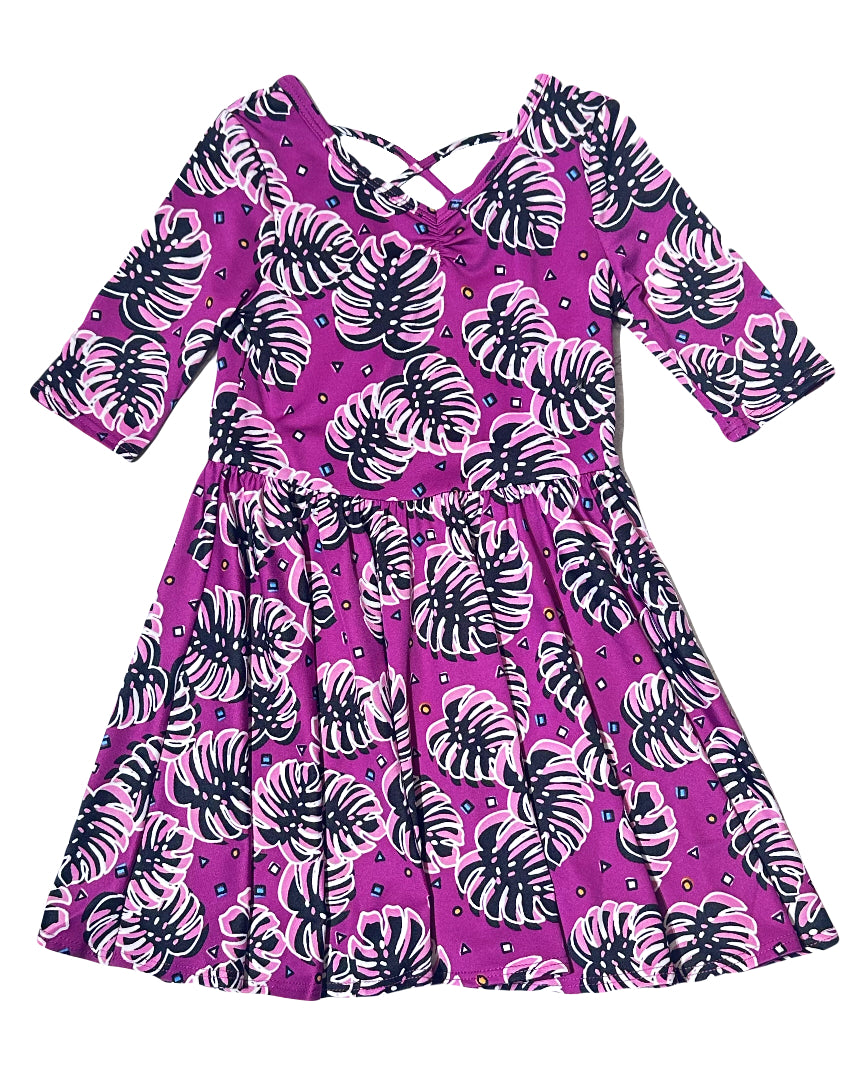 DotDotSmile Ballerina Dress with purple tropical monstera print – flat lay