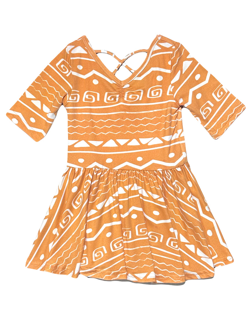 Island-inspired ballerina dress with tribal wave patterns
